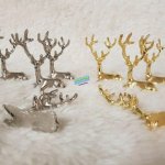 گوزن نشسته شاخ بلند