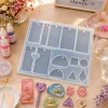 Silicone mold with peg-hole shapes, suitable for keychains.